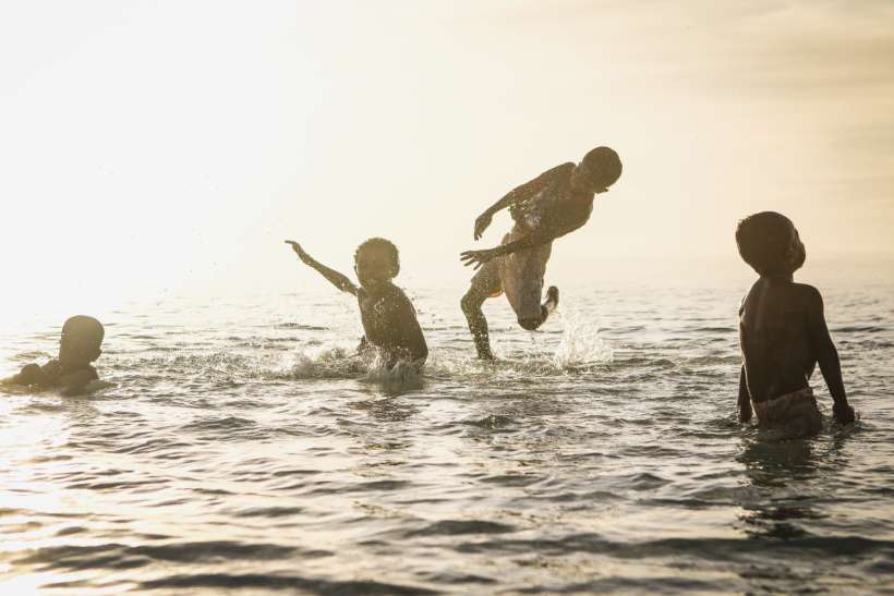 kids splashing in the water