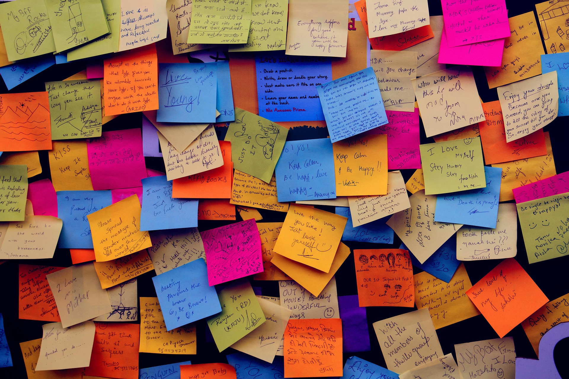 post it notes on wall of subway